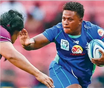  ?? ?? Rooster Chicken Fijiana Drua hooker Vika Matarugu on the run against Reds.