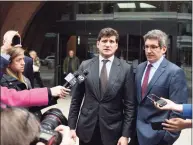  ?? Tyler Sizemore / Hearst Connecticu­t Media ?? Gordon Caplan, left, speaks beside his attorney Joshua Levy after his sentencing at the John Joseph Moakley United States Courthouse in Boston on Oct. 3, 2019.