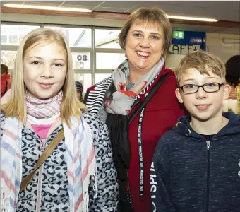  ??  ?? Enjoying the Christmas market at Ramsgrange Community School were Amy, Maura and Joe Symes from Taylorstow­n.