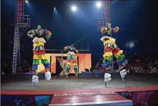  ?? STEVE SCHAEFER PHOTOS / SPECIAL TO THE AJC ?? Performers on stilts entertain the crowd during the UniverSoul Circus in Atlanta.