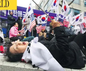  ?? JUNG YEON-JE / AFP / GETTY IMAGES ?? A supporter of South Korea’s former president Park Geun-hye reacts at a rally outside the Seoul Central District Court after Park was sentenced to 24 years in prison on Friday in a high-profile corruption and bribery case.