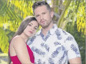  ?? John Tsiavis / USA Network ?? David Benavidez and Kate Griffith are a couple in the season premiere of “Temptation Island” airing at 10 p.m. Thursday on USA Network.