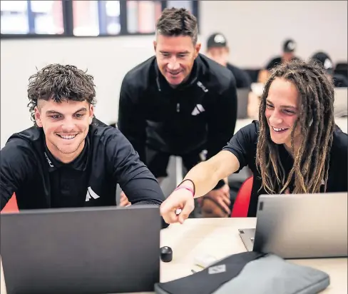  ??  ?? A new way of learning: Shepparton’s Brayden George (left) in the classroom at The Academy.