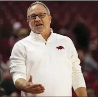  ?? (Special to the NWA Democrat-Gazette/David Beach) ?? Arkansas women’s Coach Mike Neighbors leads the Razorbacks against Troy today at Walton Arena in Fayettevil­le. Former Razorback Chelsea Dungee is in her first season as an assistant coach for the Trojans.