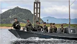  ?? PHOTO: GETTY IMAGES ?? North Korean soldiers cross the Yalu river near Sinuiju, close to the Chinese border city of Dandong, Liaoning province.