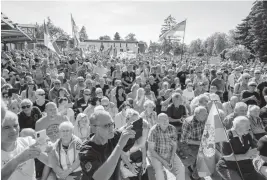  ?? STEFAN SAUER AP ?? People take part in a demonstrat­ion for the commission­ing of Nord Stream 2 gas pipeline in Lubmin, Germany, on Sunday. The protest of the demonstrat­ion was again also directed against the Russia sanctions of the E.U. in the Russian war of aggression.