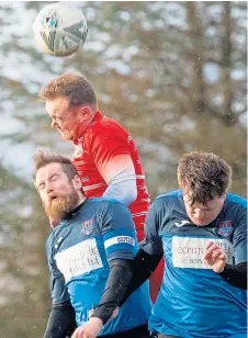  ??  ?? It’s eyes wide shut as Whitfield Tavern (red) beat Lochee Albion in the Second Division Cup.