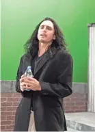  ??  ?? Tommy (James Franco) tries to get through a tough scene in “The Disaster Artist,” which pays homage to the 2003 film “The Room.” JUSTINA MINTZ