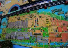  ?? Pittsburgh Post-Gazette ?? Randy Gilson has restored a map of Old Allegheny City on the wall of his North Side home.