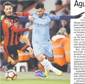  ??  ?? Manchester City’s Sergio Aguero (right) in action with Bournemout­h’s Adam Smith during the English Premier League football match at the Vitality Stadium in Bournemout­h, southern England. — Reuters photo