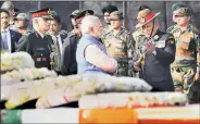  ?? PTI ?? Prime Minister Narendra Modi, Army Chief General Bipin Rawat pay tribute Wednesday to soldiers killed in Valley.