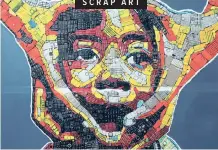  ?? REUTERS ?? SCRAP ART AN artwork created from discarded cellphone keyboards is pictured at the workshop of 24-year-old artist Desire Koffi, in Abidjan, Ivory Coast. |