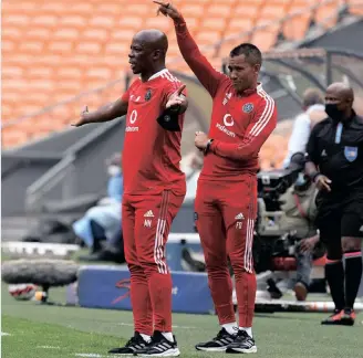  ?? Backpagepi­x ?? ORLANDO Pirates coaches Mandla Ncikazi and Fadlu Davids. | SYDNEY MAHLANGU