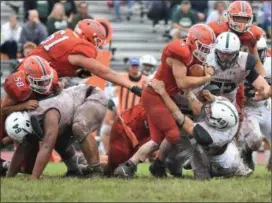  ?? BARRY TAGLIEBER - FOR DIGITAL FIRST MEDIA ?? Perk Valley’s Jon Moccia breaks though as Pennridge’s Phil Long closes in during Saturday’s game.