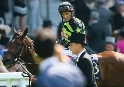  ??  ?? Jockey John Velazquez gives the thumbs up after winning the King's Stand Stake with Lady Aurelia