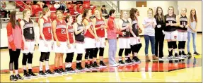  ?? MARK HUMPHREY ENTERPRISE-LEADER ?? Several Farmington senior high girls basketball players were in street clothes including starters Makenna Vanzant (far left) and Anthea Jones (center) when the team was introduced during the Tip-Off held at Cardinal Arena Saturday, Nov. 11. Coach Brad...