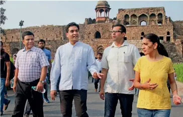  ?? — PTI ?? Delhi tourism minister Kapil Mishra visits Old Fort heritage site in New Delhi on Tuesday, World Tourism Day.