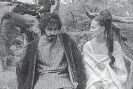  ??  ?? Gawain ( Patel) has a chat with Lady Bertilak ( Alicia Vikander) in “The Green Knight.”