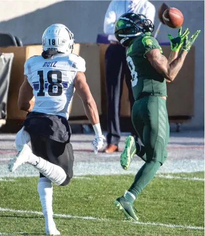  ?? NIC ANTAYA/ GETTY IMAGES ?? Michigan State’s Jalen Nailor beats Cameron Ruiz on a 75- yard touchdown reception in the first quarter.