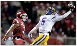  ?? NWA Democrat-Gazette/ANDY SHUPE ?? LSU cornerback Kary Vincent makes a one-handed intercepti­on on a pass intended for Arkansas receiver Deon Stewart in the fourth quarter Saturday.