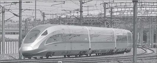  ?? Photo: IC ?? A “Fuxing” high- speed train, China’s new- generation bullet train, departs from Beijing South Railway Station for its maiden voyage to Shanghai on Monday.