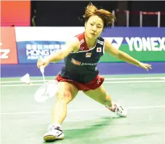  ??  ?? Japan’s Nozomi Okuhara hits a return against Thailand’s Ratchanok Intanon during their women’s singles final at the Hong Kong Open badminton tournament. — AFP photo