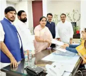  ?? SPECIAL ARRANGEMEN­T ?? Supriya Sule with her supporters (left); and Sunetra Pawar after filing their nomination papers for Baramati Lok Sabha seat on Thursday.