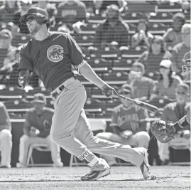  ?? MATT KARTOZIAN/USA TODAY SPORTS ?? Cubs hitter Kris Bryant singles against the Angels in the first inning of a spring training game at Tempe Diablo Stadium on Monday afternoon.