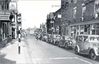  ??  ?? Busy Ashford High Street with 25 grocers shops and 10 butchers in 1953 and one of three nail bars in