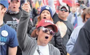  ?? LUIS M. ALVAREZ/AP FILE ?? Supporters of President Donald Trump rally at Freedom Plaza in Washington in December. Thousands are expected in the nation’s capital Wednesday as Congress meets to certify the Electoral College vote.