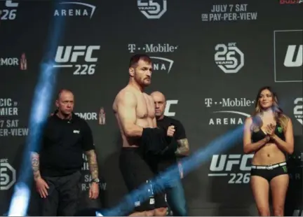  ?? TIM PHILLIS — THE NEWS-HERALD ?? Stipe Miocic walks onto the stage during a UFC weigh-in event July 6 in Las Vegas.