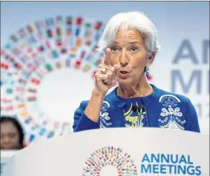  ?? JOSE LUIS MAGANA/THE ASSOCIATED PRESS ?? Internatio­nal Monetary Fund (IMF) Managing Director Christine Lagarde, speaks at the annual meetings plenary during the World Bank/IMF Annual Meetings in Washington on Friday.