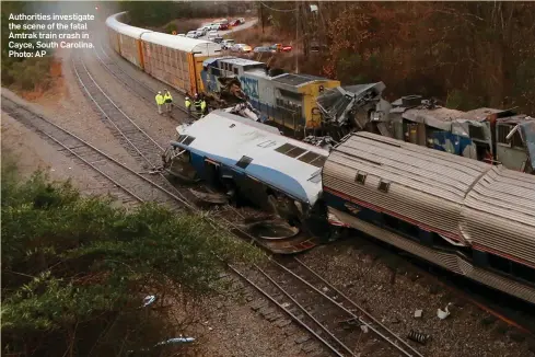  ?? Photo: AP ?? Authoritie­s investigat­e the scene of the fatal Amtrak train crash in Cayce, South Carolina.