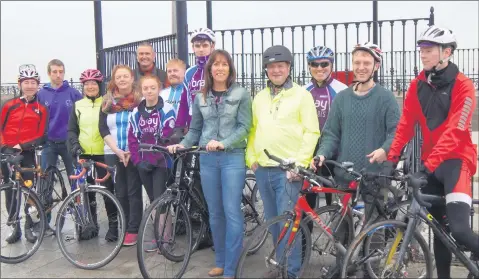  ??  ?? Tommy Hanratty is joined by the Bray Wheelers who had a cycle to his new shop opening recently