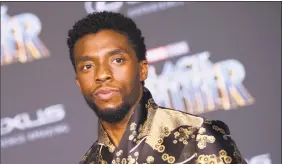  ?? VALERIE MACON / AFP/Getty Images ?? Chadwick Boseman attends the world premiere of Marvel Studios “Black Panther” on Jan. 29 in Hollywood.