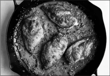  ?? JOHNNY MILLER / THE NEW YORK TIMES ?? Simple-sounding chicken breasts with lemon is a tried-and-true recipe from one of New York Times Cooking’s GOATS: Pierre Franey, who wrote the long-running column 60-Minute Gourmet.