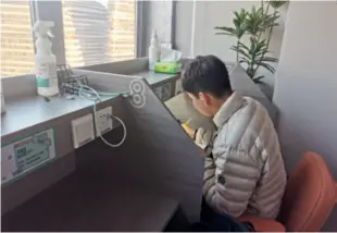  ?? ?? Jeong U-Kim, a seventh grader from the Republic of Korea, studies at a paid study room in Beijing on January 2