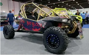  ??  ?? THRILLS AND SPILLS... Traverse the terrain with this mean custom-built 2016 polaris RZR XP Turbo — named ‘Bad Blood’ — the coolest crossover vehicle you will ever set your eyes on.