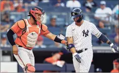  ?? Adam Hunger / Associated Press ?? Orioles catcher Pedro Severino tags out the Yankees’ Gleyber Torres for the final out in the ninth inning Saturday in New York.