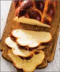  ?? Carl Tremblay/America’s Test Kitchen via Associated Press ?? Challah, from the cookbook “Bread Illustrate­d.”