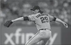  ?? Bay Area News Gorup/tns ?? Jeff Samardzija of the San Francisco Giants throws a pitch in the bottom of the third inning against the Philadelph­ia Phillies at Citizens Bank Park on Wednesday in Philadelph­ia.