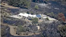  ?? GEORGE HEARD, NIKKI MACDONALD/STUFF ?? It was nothing short of a miracle that only one house was lost to the fires. Right, The Richmond A&amp;P showground­s were opened up to accommodat­e evacuated animals of all shapes and sizes.