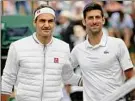  ?? Tim Ireland / Associated Press archive ?? Roger Federer, left, and Novak Djokovic played an epic final in 2019, a 5-setter won by Djokovic, who saved two match points.