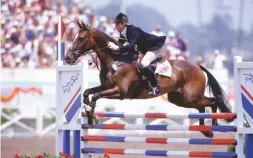  ??  ?? Lucinda rides Regal Realm in the 1984 Los Angeles Olympics, helping the British claim team silver and finishing sixth individual­ly