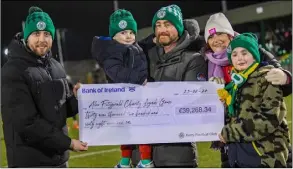  ?? Photo by Adam Kowalczyk ?? Kerry FC Sporting Director Billy Dennehy presenting a cheque for over €39,000 to the Fitzgerald family before last Friday’s game against Treaty United in Mounthawk Park.