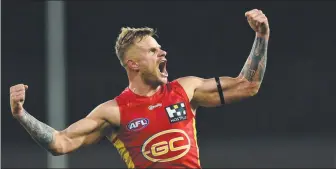  ?? Picture: MATT ROBERTS/AFL PHOTOS ?? An animated Brandon Ellis celebrates a goal for the Suns.