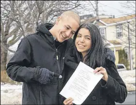  ?? JOE GIBBONS/SALTWIRE NETWORK ?? Jessica King and her boyfriend, Ryan Macfarlane, officially filed legal documents at Newfoundla­nd and Labrador Family Court in St. John’s last week to have King, 30, adopted by her foster family.