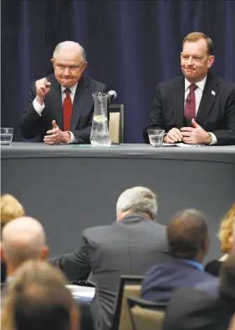  ?? Michael Macor / The Chronicle ?? U.S. Attorney General Jeff Sessions (left) is joined by McGregor Scott, U.S. attorney for California’s eastern district, before his remarks to the California Peace Officers Associatio­n.