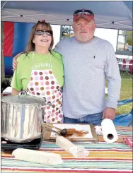  ?? RITA GREENE/MCDONALD COUNTY PRESS ?? David and April Hurst of Carthage brought their chili to compete in the chili cookoff at the Oktoberfes­t Saturday at Pineville Square.