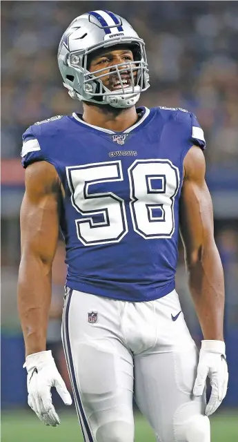  ?? RON JENKINS/AP ?? Free-agent acquisitio­n Robert Quinn, who had 11½ sacks with the Cowboys last season, is making the transition from 4-3 defensive end to 3-4 outside linebacker with the Bears this season.